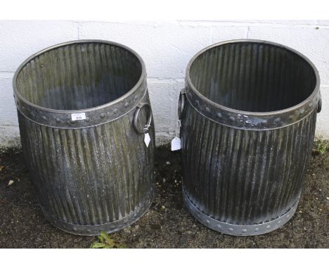 Two metal garden planter bins. Handles to either side, H50cm Condition Report: whilst they are not very heavy, therefore quit