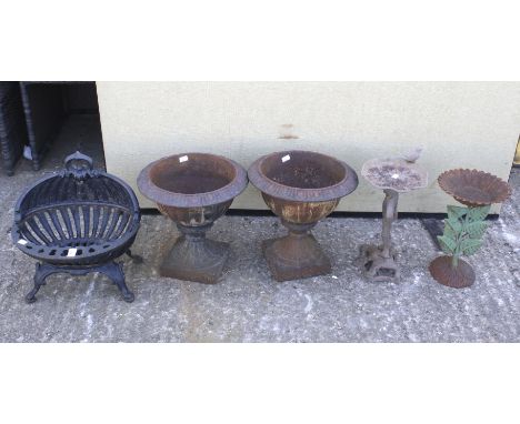 A pair of vintage metal garden urns, two bird baths and a fire basket grate. Max. H35cm