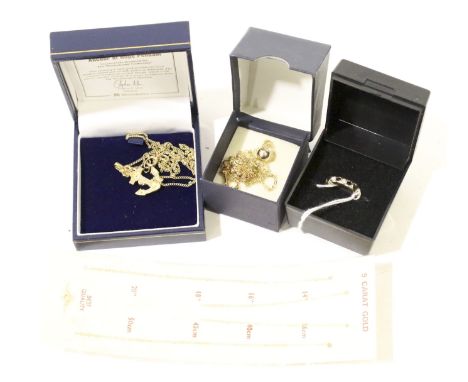 An assortment of 9ct gold and yellow metal jewellery. Including an anchor pendant, a sapphire and diamond ring, chains, etc. 