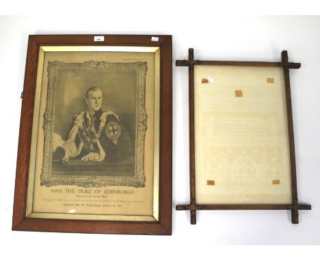 An Arts and Crafts wooden frame and a newspaper print of The Duke of Edinburgh. The print dated 1952 from the Sunday Dispatch