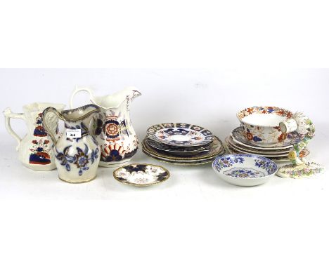 An assortment of Victorian and later ceramics. Including Imari style jugs and plates, a Meissen candleholder, etc.