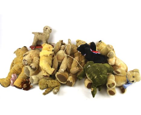 A collection of vintage teddy bears. Of various sizes and designs, some with golden mohair and articulated limbs