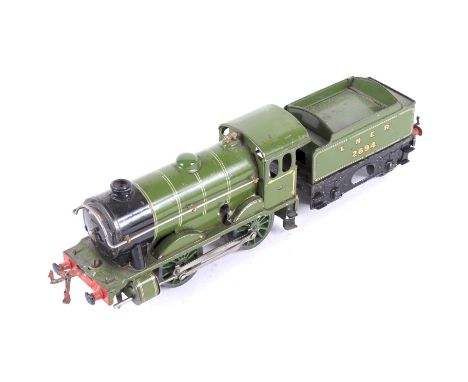 A Hornby O gauge tinplate clockwork locomotive and tender. 4-4-0, in LNER livery, no. 2694