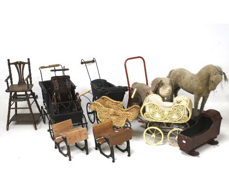 An assortment of vintage childrens' toys. Including prams, push-along animals, dolls furniture, etc. Max. H65cm