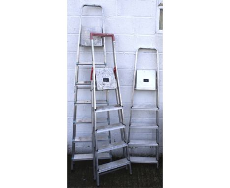 Three assorted aluminum step ladders. Beldray and Hailo, etc.