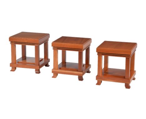 After Frank Lloyd Wright, three light wood occasional tables by Cassina, stamped marks, circa 1989, 41cm high, 36cm wide, 36c