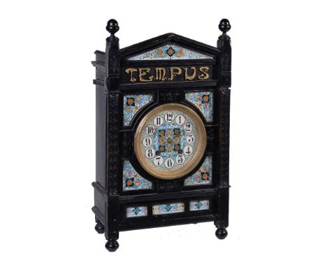 An Aesthetic Movement ebonised mantel clock, late 19th century, in the manner of Lewis Foreman Day, the eight-day gong striki