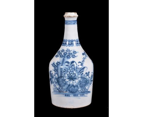 An English delft blue and white chinoiserie water bottle, circa 1770, painted with flowers, 27cm high   Cf. Michael Archer, D