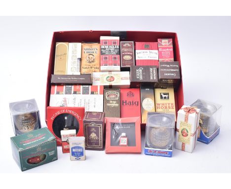 A collection of vintage Scotch Whisky miniature boxed bottles. The lot to include 10 years old Glenmorangie, a Glenfarclas 10