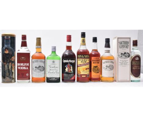 A collection of spirits comprising of three bottles of Southern Comfort liquor whisky (one boxed) 40% vol, 1 litre, a Gordon'