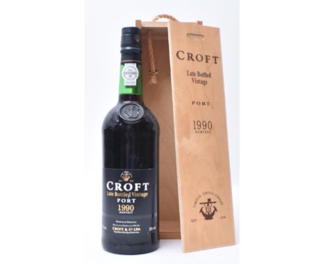 A Croft Late Bottled Vintage Port 1990 Harvest bottle in original wooden case. 75cl bottle. 20% vol.