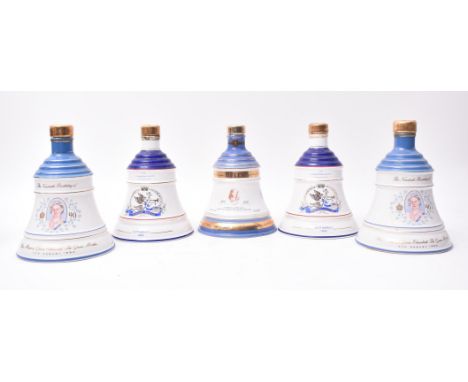 Five Bell's Old Scotch Whisky Wade porcelain Royal Family Commemorative bell decanters. The lot comprising of two decanters c