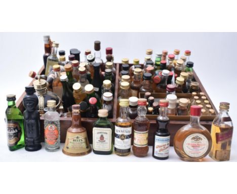 A collection of vintage liquors, spirits &amp; whiskies miniature bottles. The lot comprising of Glenfiddich, Remy Martin, Di