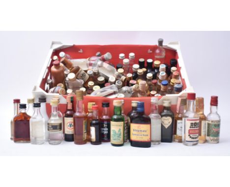 A large collection of vintage 20th century miniature spirits collectibles &amp; souvenir bottles. The lot comprising Smirnoff