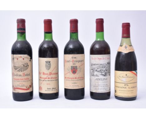 Five vintage 20th century French red wine bottles. The lot to include an Adeline, a Chateau Soleil, a Chateau Haut Plaisance,