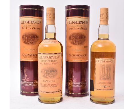 Two Glenmorangie Single Highland Malt Scotch 10 Years Old Whisky&nbsp;bottles in tin tubular cases. 1 litre bottles. 40% vol.
