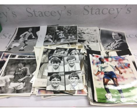 A box of approx 160 sporting photos, mostly football players from the 1980s & 90s, including some signed examples. Shipping c