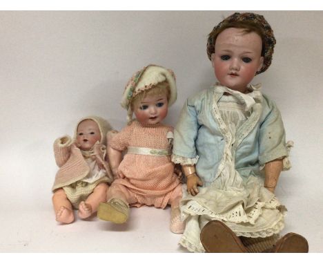Three early 20th century bisque head and composition jointed body dolls two Armand Marseille dolls and an AM Koppelsdorf 300-
