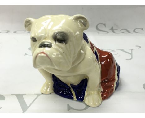 A vintage Royal Doulton porcelain Union jack bulldog figure. No obvious damage or restoration. This lot cannot be posted