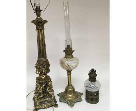 A late Victorian opaque glass oil lamp and one other brass and glass oil lamp sold without reserve and a 20th century brass l