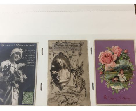 A box containing a collection of albums of postcards including a well presented album of Vintage greetings and Christmas card