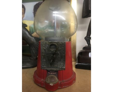 A Vintage bubble gum machine.