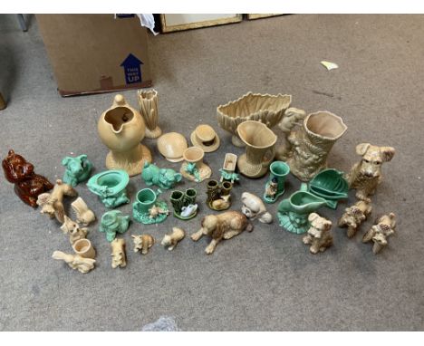 A large collection of Sylvac pottery together with additional ceramic figurines.