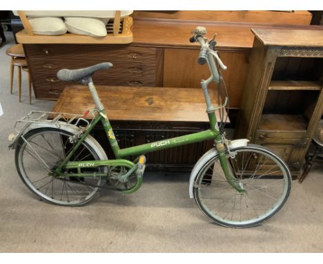 A vintage Puch promenade 20 bicycle.