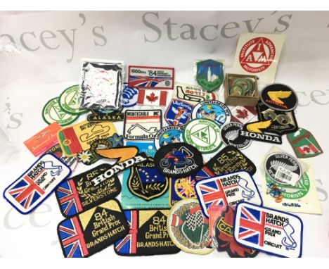 A collection of vintage badges patches mainly motorist/ motorbike badges also some scout badges. Postage category B