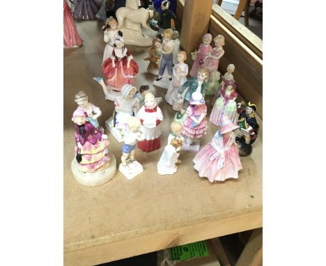 A collection of Royal Worcester and Doulton porcelain figures, also including a Dresden figure. This lot cannot be posted