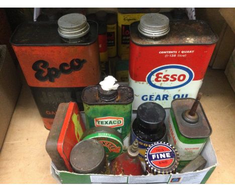 A collection of vintage motoring related tins including Esso gear oil, Epco oil and others. Shipping category D.