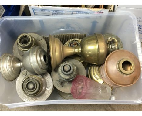 A collection of oil lamp bases and other associated items and oddments.