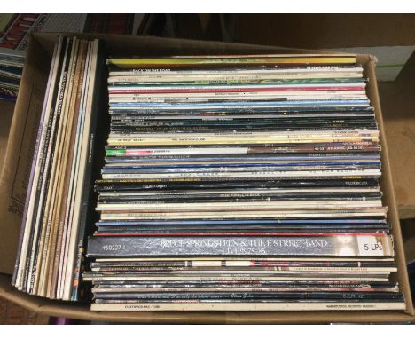 Two boxes of LPs by various artists including Led Zeppelin, Bruce Springsteen, The Rolling Stones and others. Shipping catego