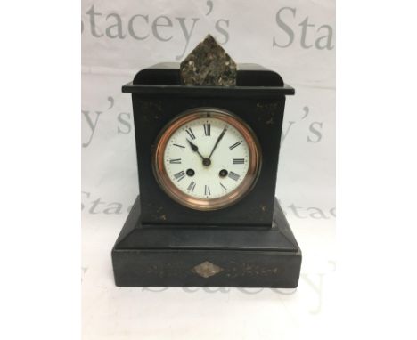 A black slate mantle clock. Shipping category D. NO RESERVE