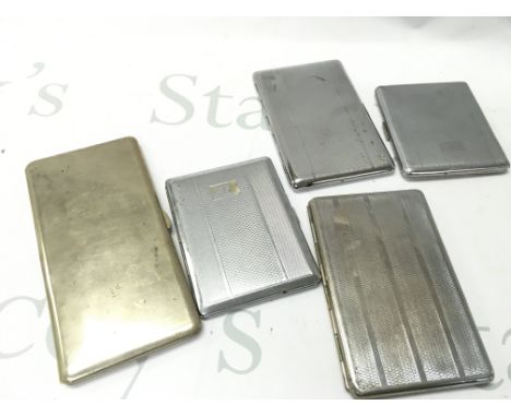 A collection of vintage cigarette cases , postage category B