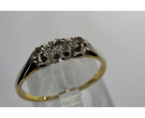 18ct gold diamond set trilogy ring, size L, 1.6g. P&amp;P Group 1 (£14+VAT for the first lot and £1+VAT for subsequent lots) 