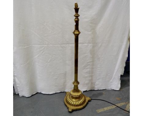 Brass floor standing lamp on circular base, H: 123 cm. Not available for in-house P&amp;P 