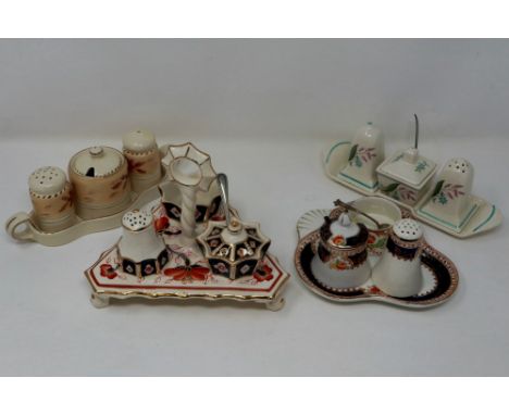 Four mixed cruets including a Victorian Hammersley example, largest L: 20 cm, heavy crazing to one. P&amp;P Group 3 (£25+VAT 