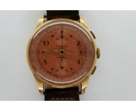 SUISSE: 18ct gold gents chronograph Suisse wristwatch on a leather strap, back is stamped 18k 0.750. P&amp;P Group 1 (£14+VAT