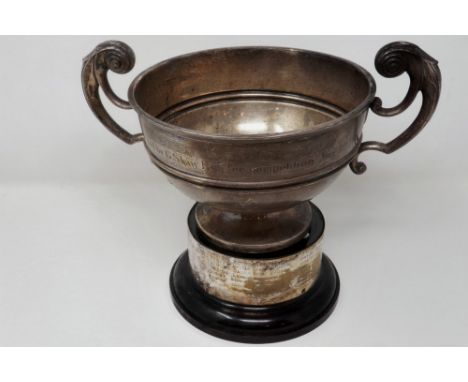 Hallmarked silver twin handled trophy dated 1914 with stand, 580g, overall H: 23 cm. P&amp;P Group 2 (£18+VAT for the first l