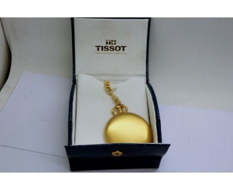 TISSOT: gold coloured quartz pocket watch and chain in original box, working at lotting. P&amp;P Group 1 (£14+VAT for the fir