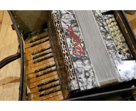 Cased Geraldo accordion made in Germany, wear to case. P&amp;P Group 3 (£25+VAT for the first lot and £5+VAT for subsequent l