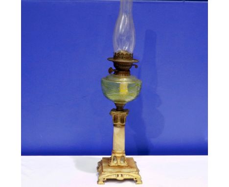 Brass mounted and coloured glass paraffin lamp with chimney, H: 71 cm. Not available for in-house P&amp;P 