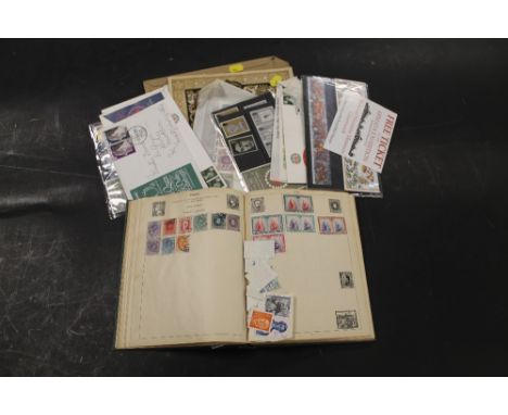 A STAMP ALBUM TO INCLUDE COMMONWEALTH, GREAT BRITAIN, ETC TOGETHER WITH PRESENTATION PACKS, ETC