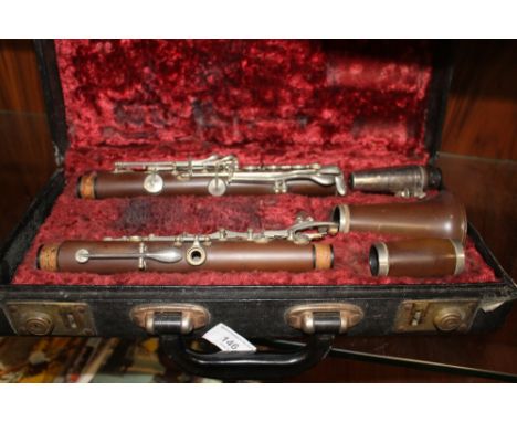 A BOOSEY AND HAWKES CASED CLARINET 