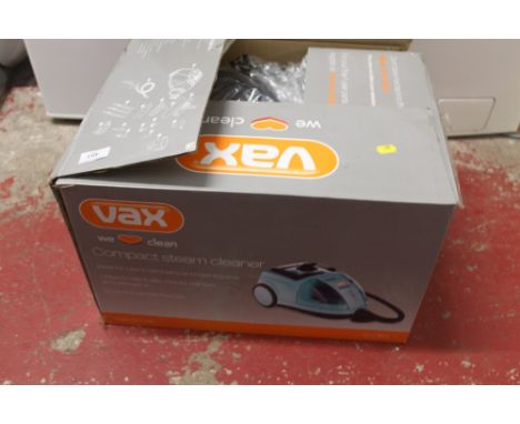 A BOXED VAX COMPACT CLEANER