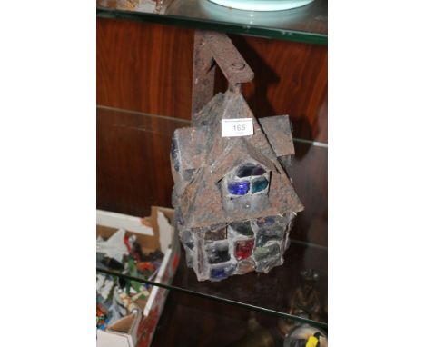 A GLASS AND CAST OUTDOOR LANTERN 