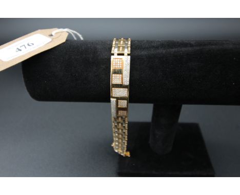 18 link coil gilt and dimante heavy ladies bracelet in light brown rectangular case 68.4g possibly rose cut diamond set 18ct 