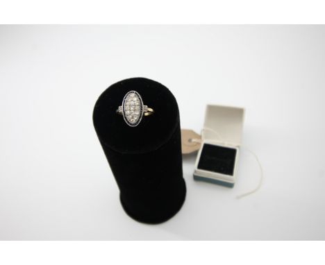 Diamond 15 stone and sapphire ring marked 18ct in light blue box 