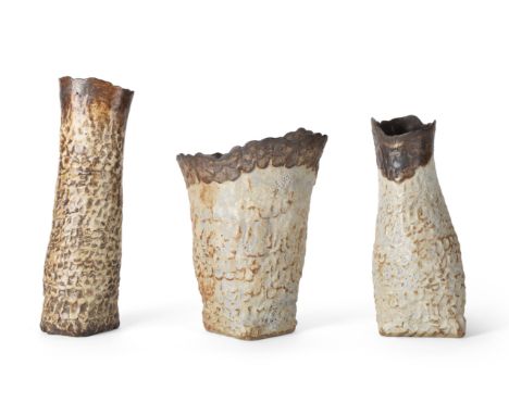 Deirdre Burnett (1939-2022) Three hand built vases, second half 20th century  Lava glazed earthenware  Impressed 'DB'  Talles